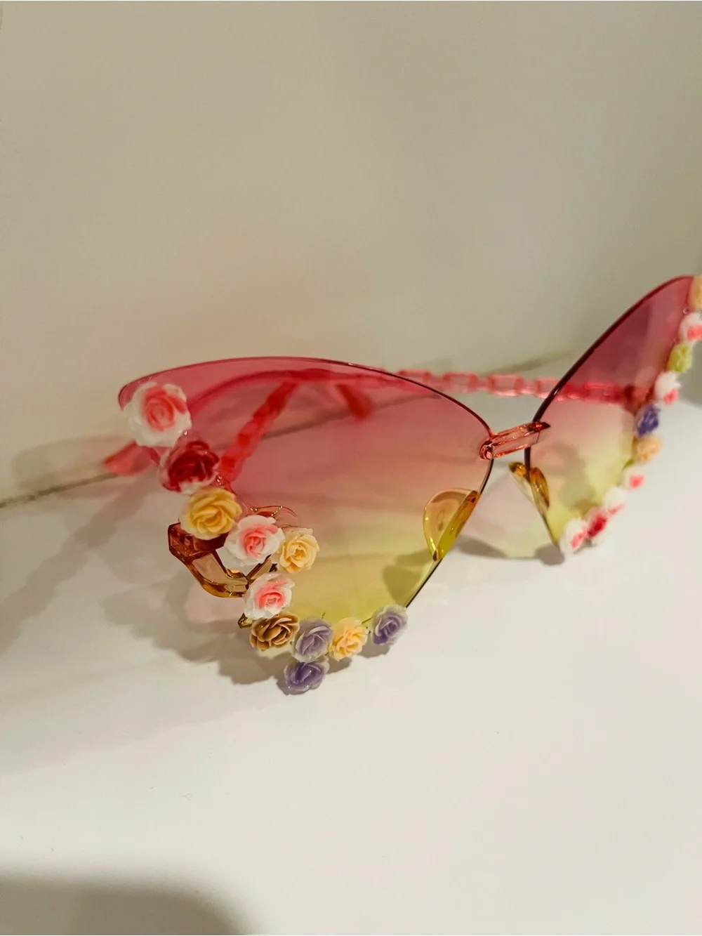 NWT Butterfly wing sunglasses (resin) feature a vibrant pink-to-yellow gradient